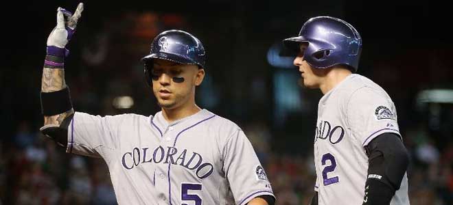 Carlos Gonzu00e1lez hizo gala de su poder frente al pitcheo de Arizona. Con su undu00e9cimo bambinazo cortu00f3 una cadena de 14 juegos sin jonru00f3n. (Foto: espn.com)