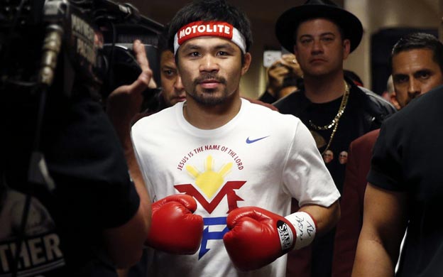 Pacquiao dijo que ahora Nike solo patrocina su indumentaria arriba del cuadrilu00e1tero. Foto: EFE