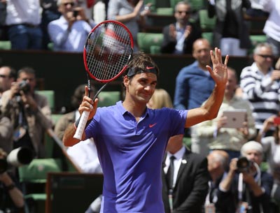 Federer pasó tranquilo a cuartos de final