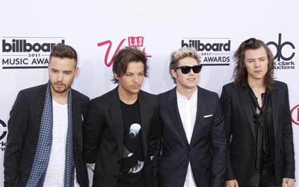 One Direction promete volver a los escenarios