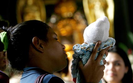 Comunidad marabina llena de flores la Basílica
