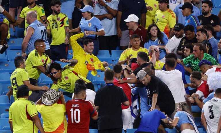 Jugadores uruguayos saltan a la grada y pelean con hinchas colombianos