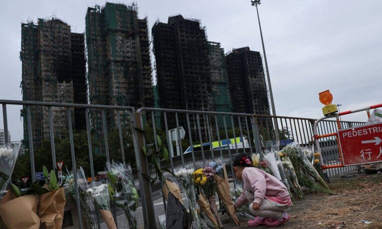 Suman 151 muertos y 13 arrestos por homicidio imprudente en incendio de Hong Kong